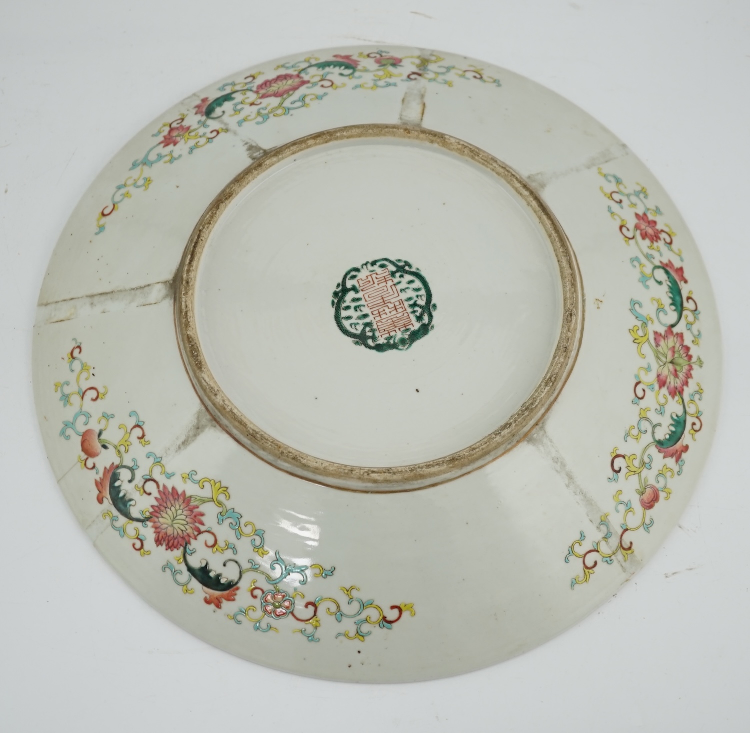 A Chinese yellow ground ‘dragon’ dish, late 19th century, minor damage